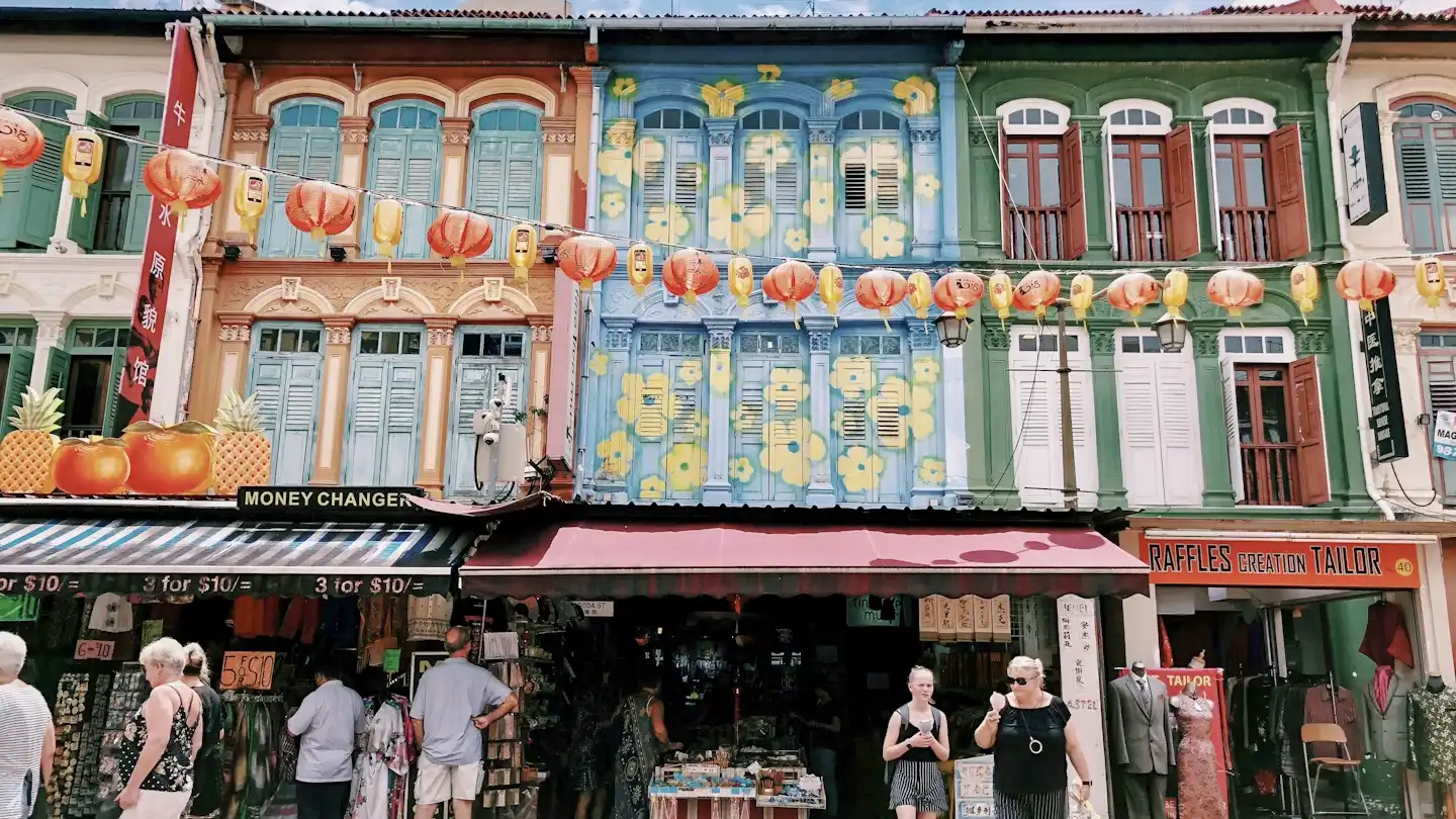 Colourful shophouses and lanterns in Singapore’s Chinatown, a lively area easily reached from a hotel near MRT Singapore.