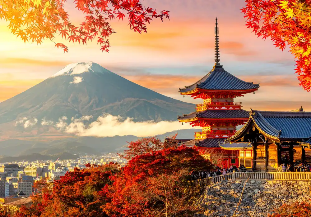 Kiyomizu-deta temple with Mt. Fuji in the background during an autumn sunset in Japan