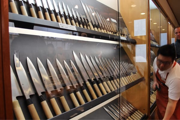 Japanese kitchen knives on display, a popular souvenir linked with Nishiki Market in Kyoto hotels area