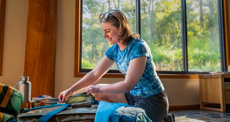 Australian traveller packing for a trip, preparing to enjoy a Seoul long stay package