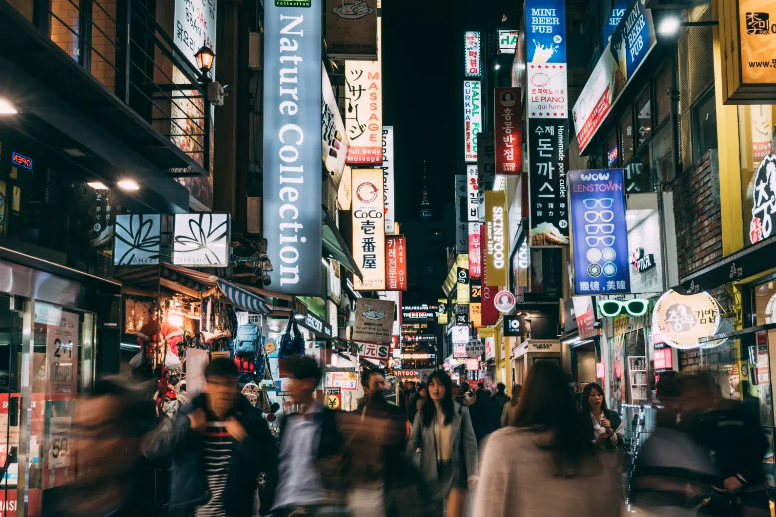 People wandering on Myeongdong, Seoul at night