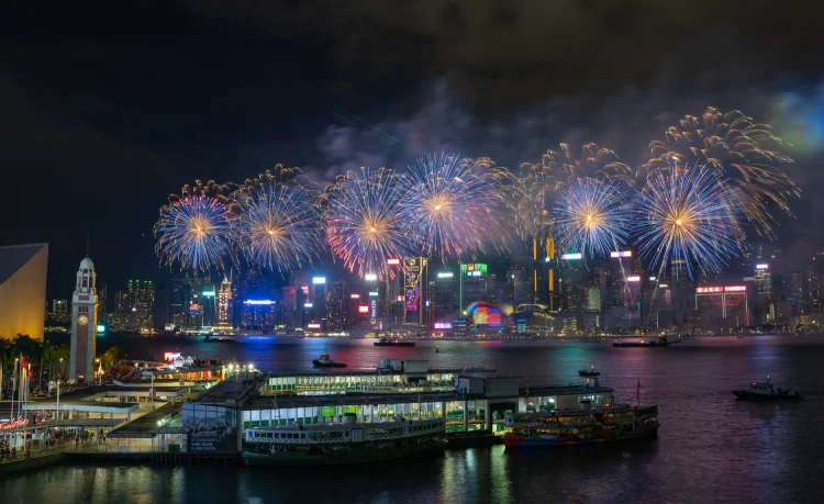 Fireworks over the horizon of the Victoria Harbour ring in the new year for Hong Kong